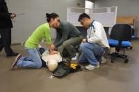 First aiders offer assistance to the personnel with cardiac arrhythmias (simulated scenario)